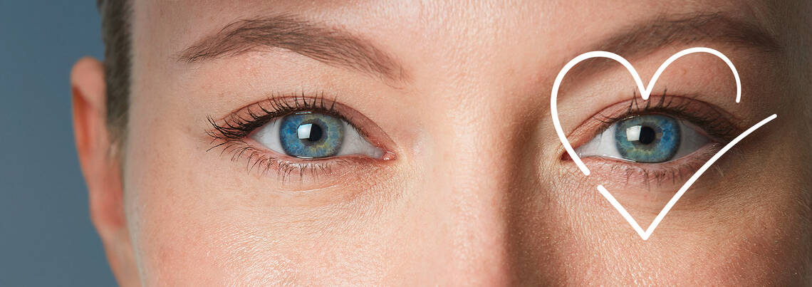 Close-up eines Frauengesichts mit Herz-Scribble um ein Auge